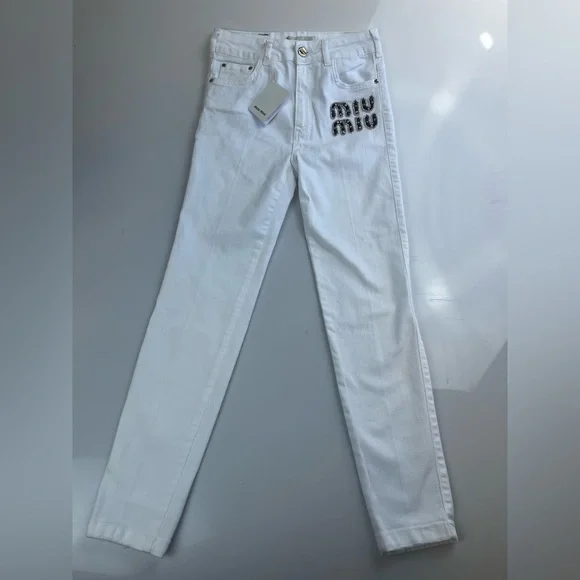 【関税込み】MiuMiu Jeans with leather inserts Miu Miu Leather-Trimmed Jeans in Blue | Lyst UK